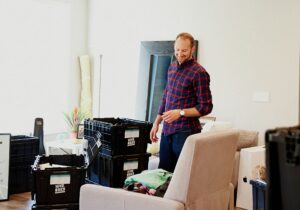 Professional team providing move-in move-out cleaning services in a residential apartment.
