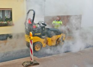 Post construction cleaning team removing dust and debris from newly renovated space
